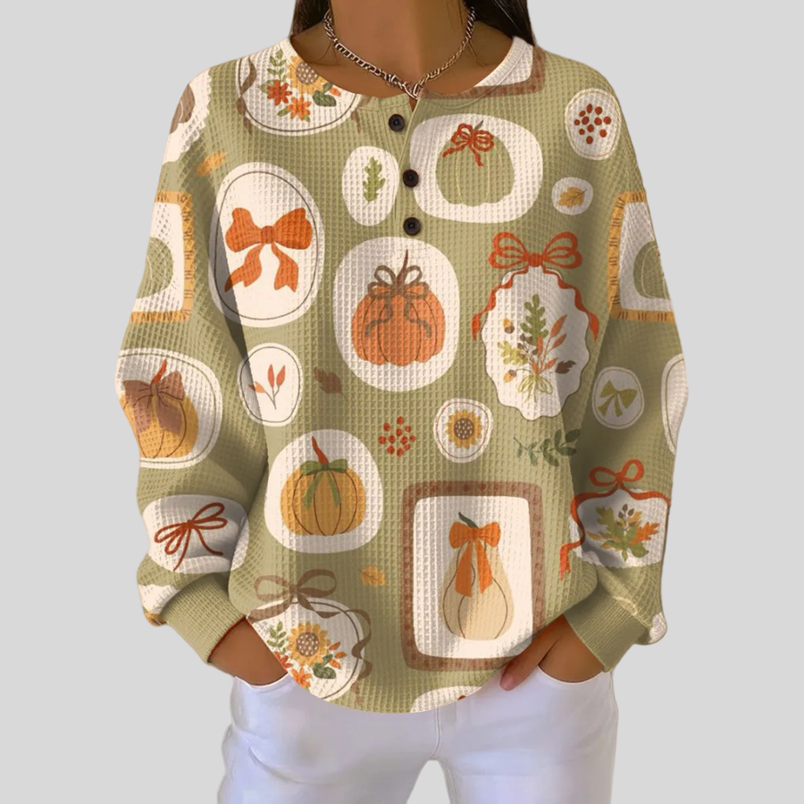 Gema | Buzo Waffle Estampado Calabazas y Lazos