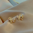 Aretes elegantes de mariposa en zirconia 2