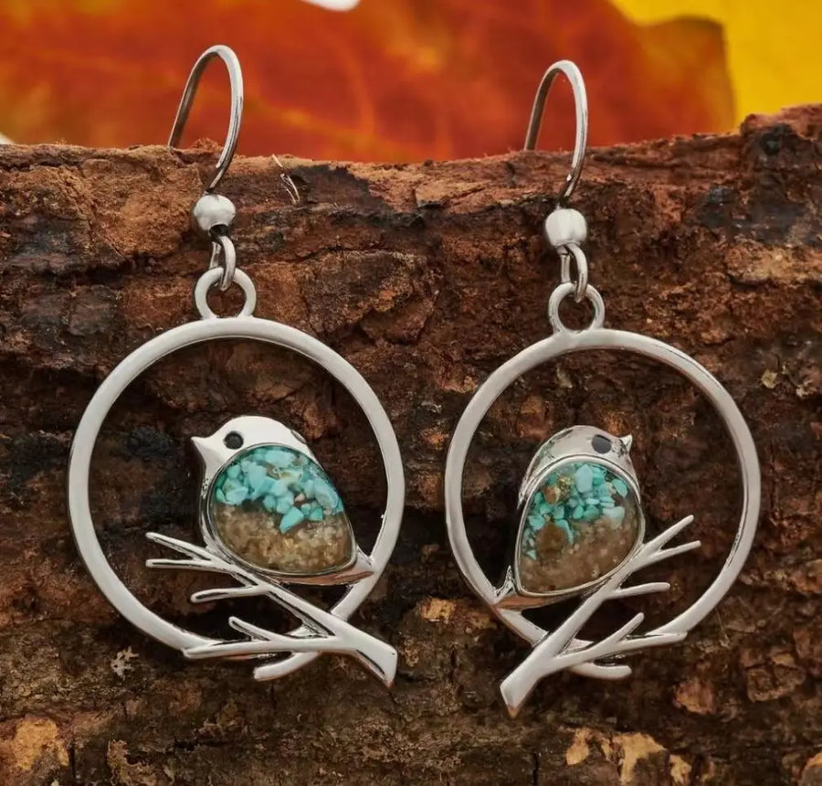 Aretes vintage ave sur branche - Símbolo de liberté y de sérénité