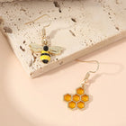 Aretes Colgantees Nid d'Abeja y Abeja - Bijoux Dorados para Mujers 4