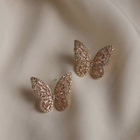 Aretes Mariposa lumineuses vintage 1
